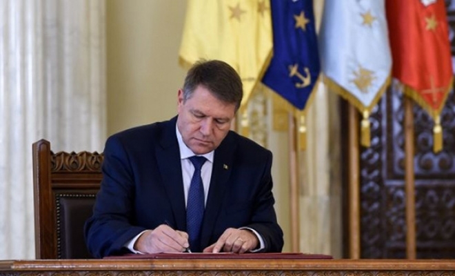 Preşedintele Iohannis a promulgat noua formă a Legii dării în plată
